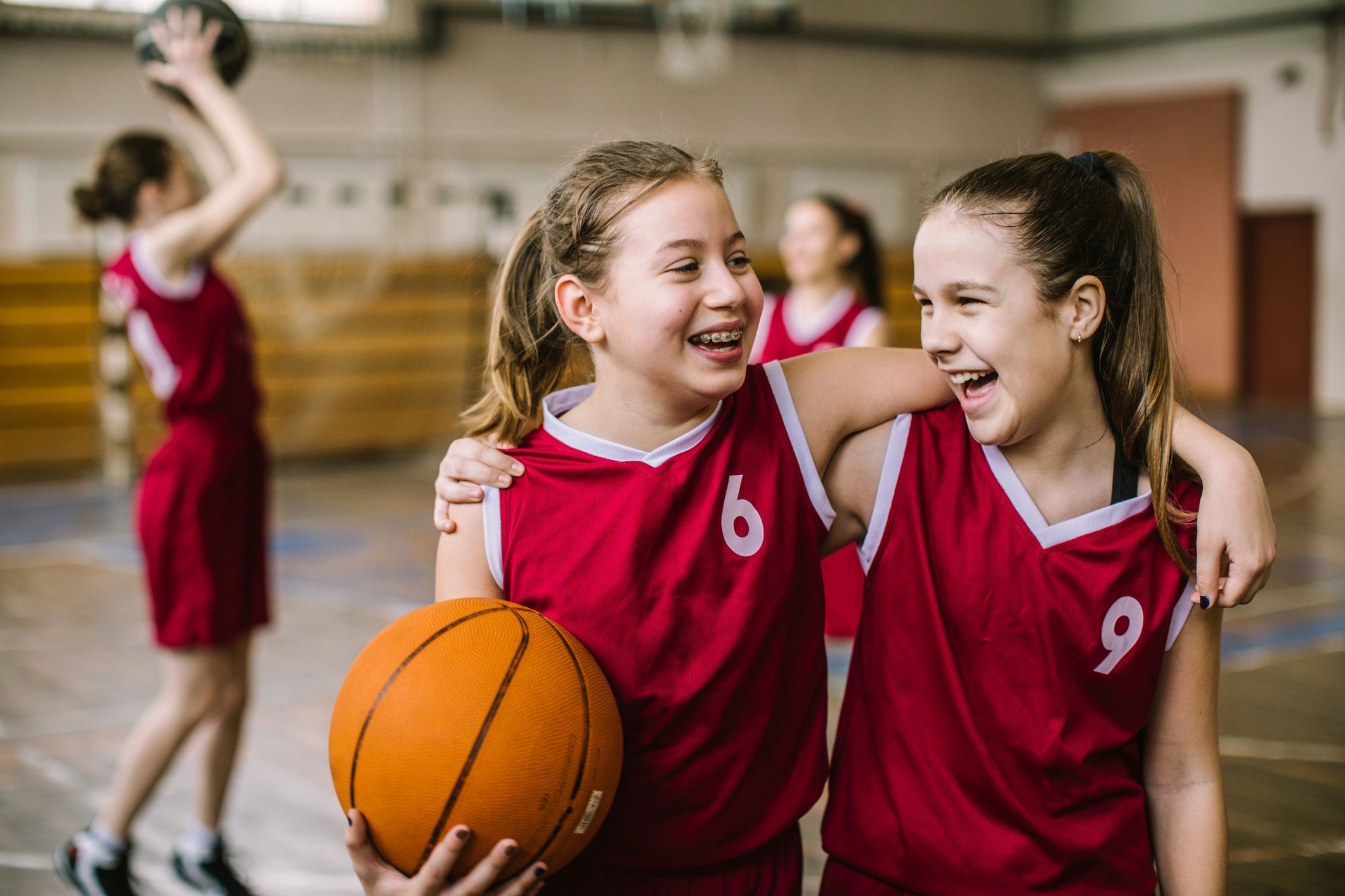 girls playing basketball